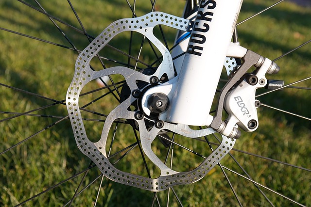 A close-up view of a bicycle disc brake system and wheel