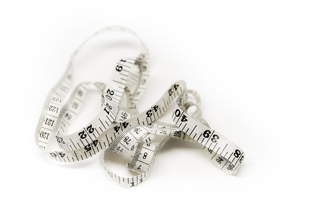 A white measuring tape on a white background