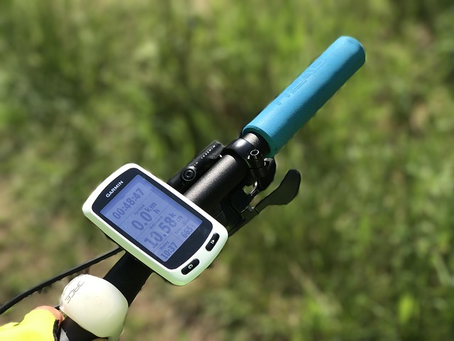 A Garmin bike computer mounted on bicycle handlebars